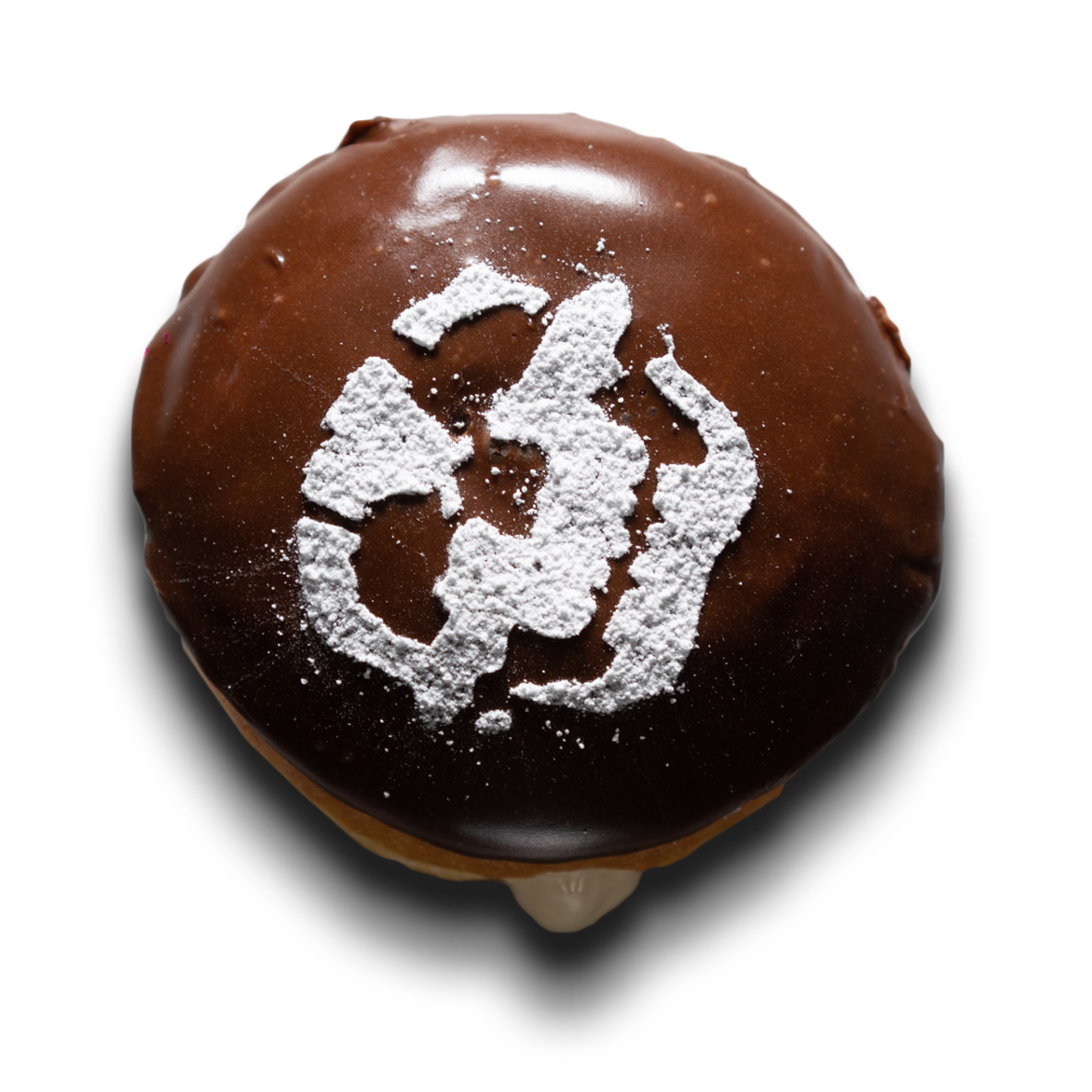 boston scream pie - A donut so good that it’s scary! Skull adorned, choco frosted, and  vanilla cream filling! You’ll come a- screamin’ back for this classic!